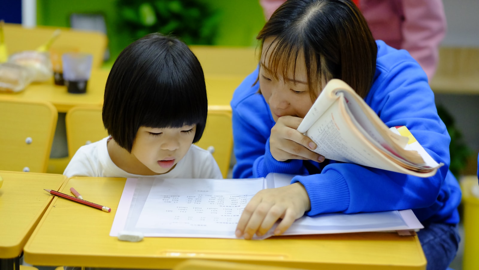 Kids collaborating in a colorful classroom