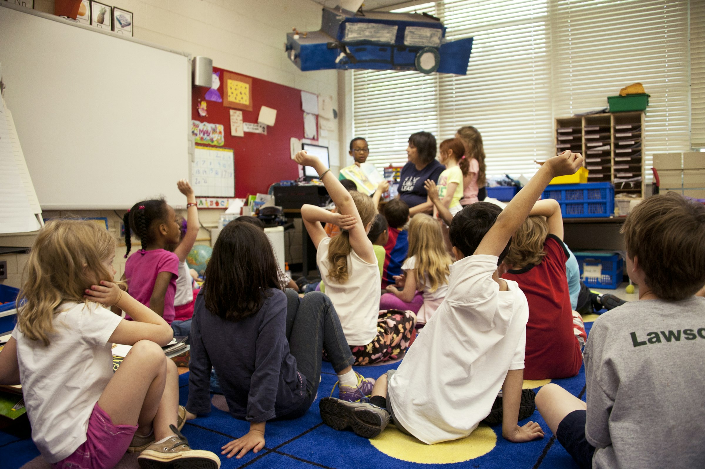 Children learning together in a bright classroom